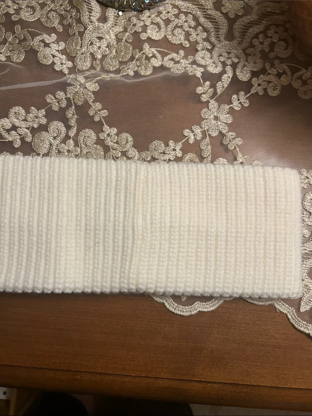 Coach Cream Ribbed Knit Beanie with Embossed Leatherware Patch. Like new.